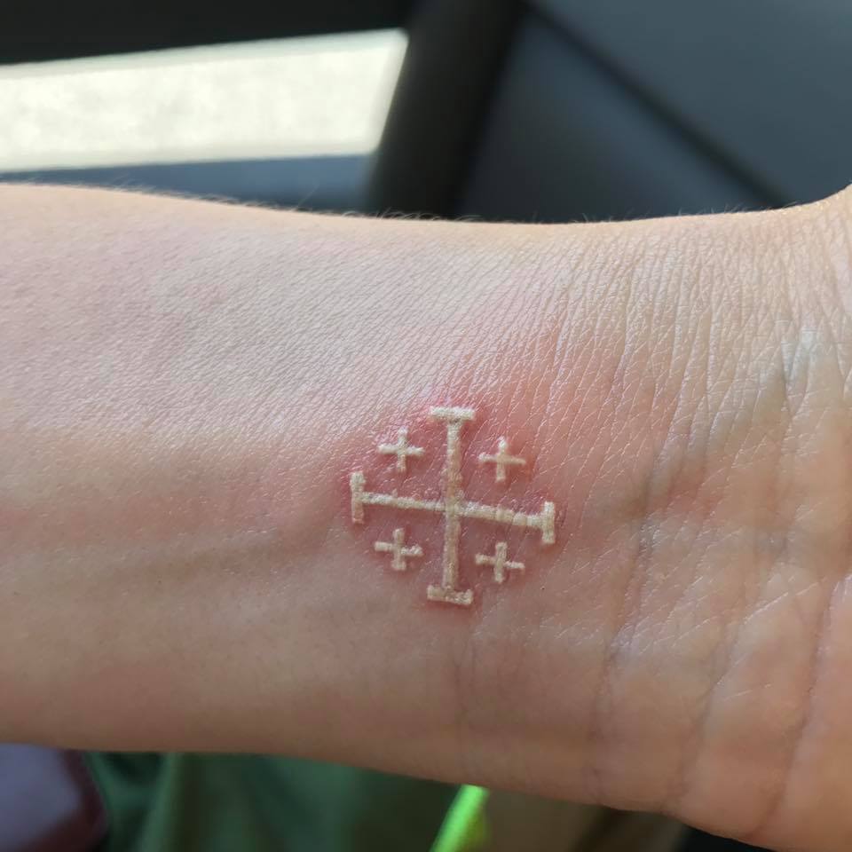 Jerusalem Cross tattoo in white ink.